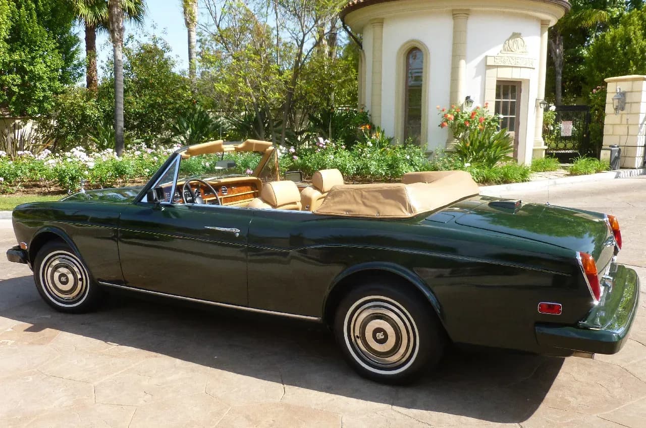 Green 1983 Rolls-Royce Corniche Convertible exterior with convertible roof for wedding car rental in Kern County, CA Green 1983 Rolls-Royce Corniche Convertible exterior with convertible roof for wedding car rental in Kern County, CA