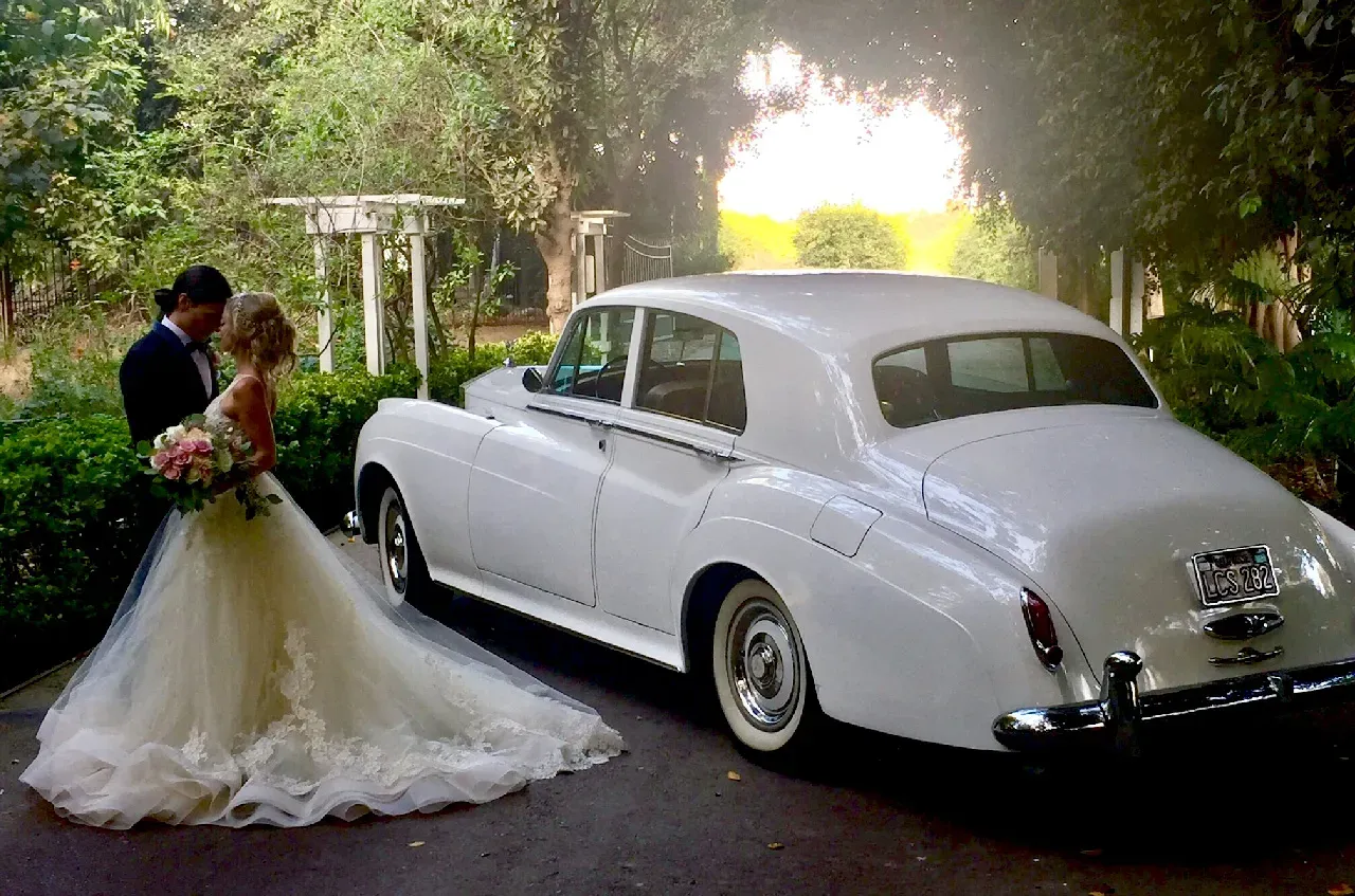 White 1960 Rolls-Royce Silver Cloud II exterior for wedding car rental in Tarzana, CA