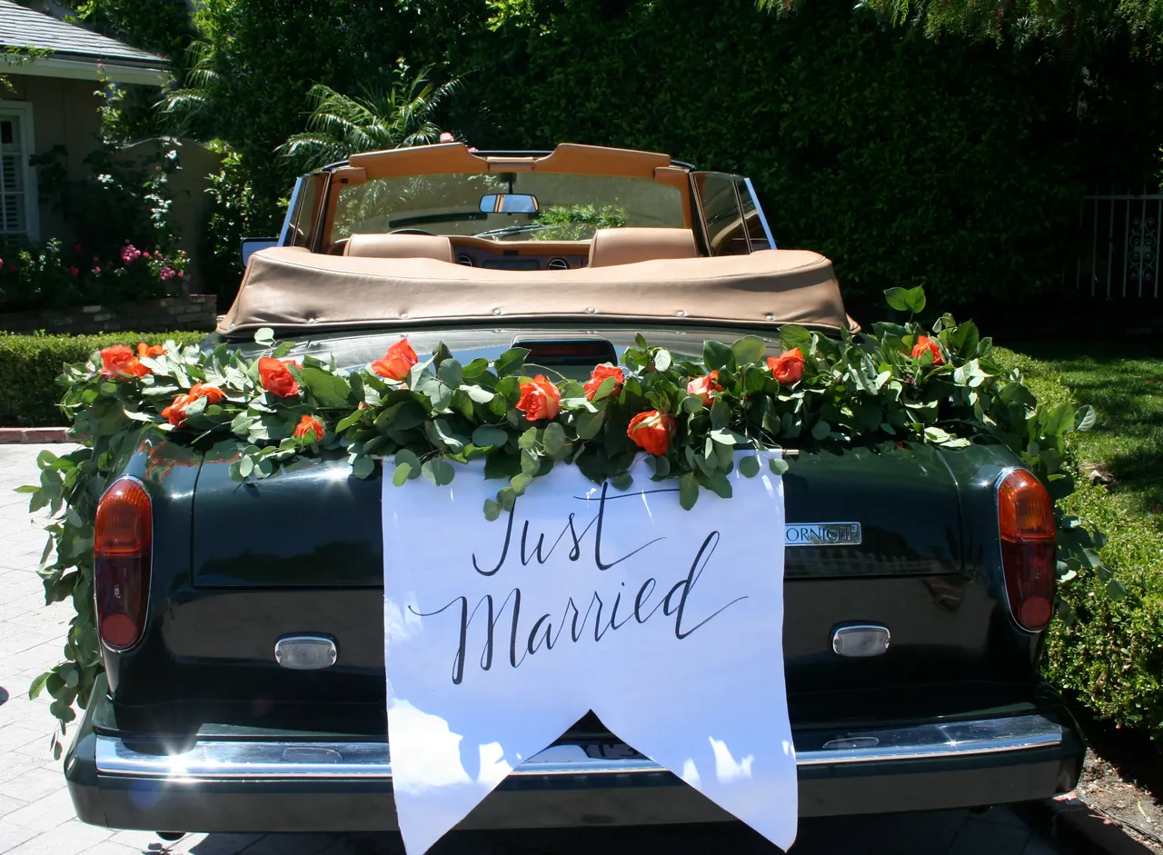 Green 1983 Rolls-Royce Corniche Convertible exterior with convertible roof, photo 7 for wedding car rental in Reseda, CA