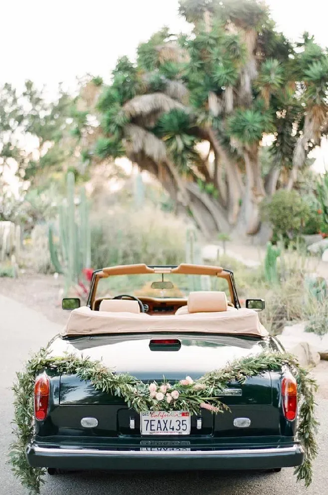 Green 1983 Rolls-Royce Corniche Convertible exterior with convertible roof, photo 10 for wedding car rental in Reseda, CA