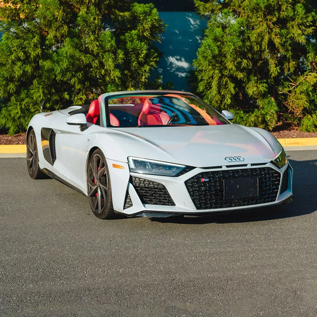 Silver 2022 Audi R8 V10 Spyder Iblis for wedding car rental in Rockville, MD Silver 2022 Audi R8 V10 Spyder Iblis for wedding car rental in Rockville, MD