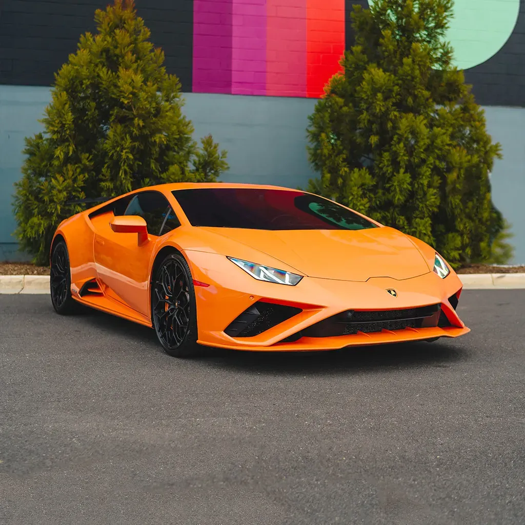 Orange 2022 Lamborghini Huracan EVO Arancia Atlas for wedding car rental in Franklin County, PA Orange 2022 Lamborghini Huracan EVO Arancia Atlas for wedding car rental in Franklin County, PA