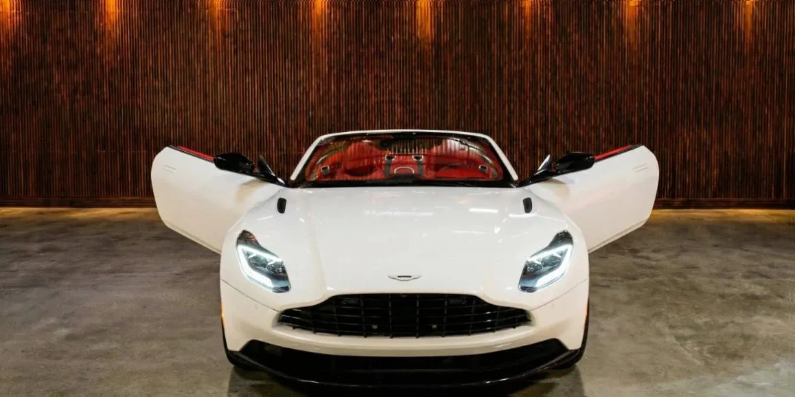 White Aston Martin DB11 with convertible roof for wedding car rental in Toms River, NJ White Aston Martin DB11 with convertible roof for wedding car rental in Toms River, NJ
