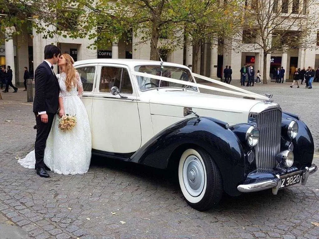 Silver Bentley 1957 for wedding car rental in Archer City, TX