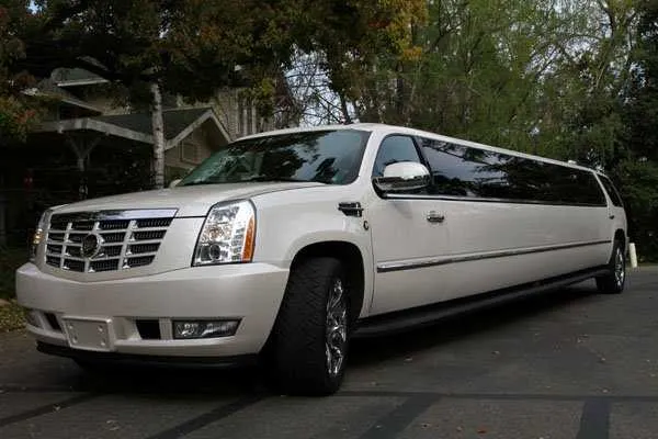 White Cadillac Escalade Limo with tinted windows for limo rental in Churchill County, NV