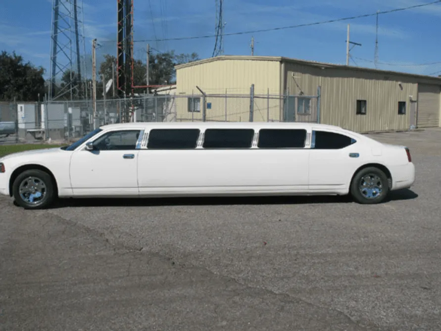 White Dodge Charger exterior with tinted windows for limo rental