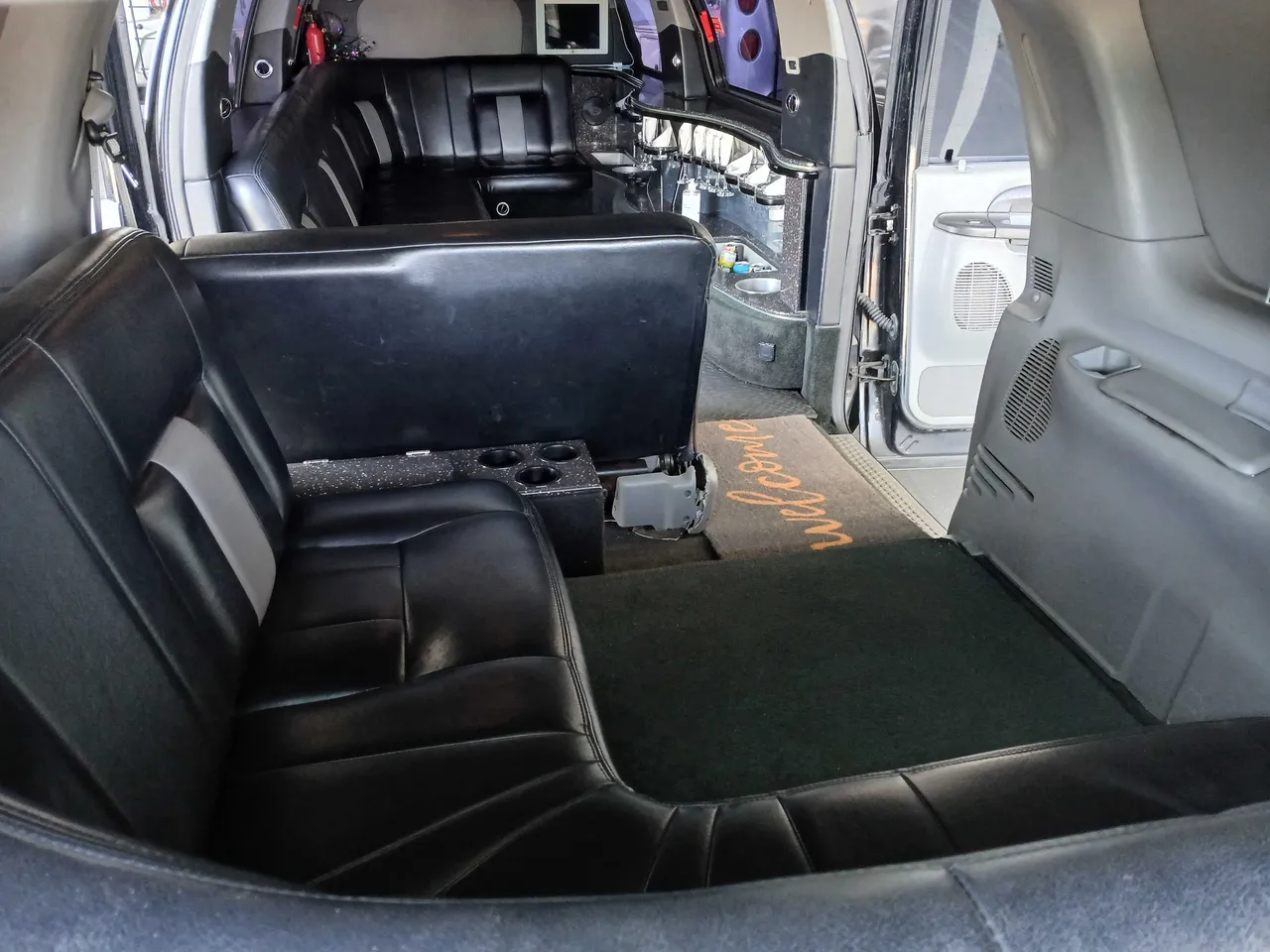 Excursion limo interior with cup holders for limo rental in Idyllwild, CA