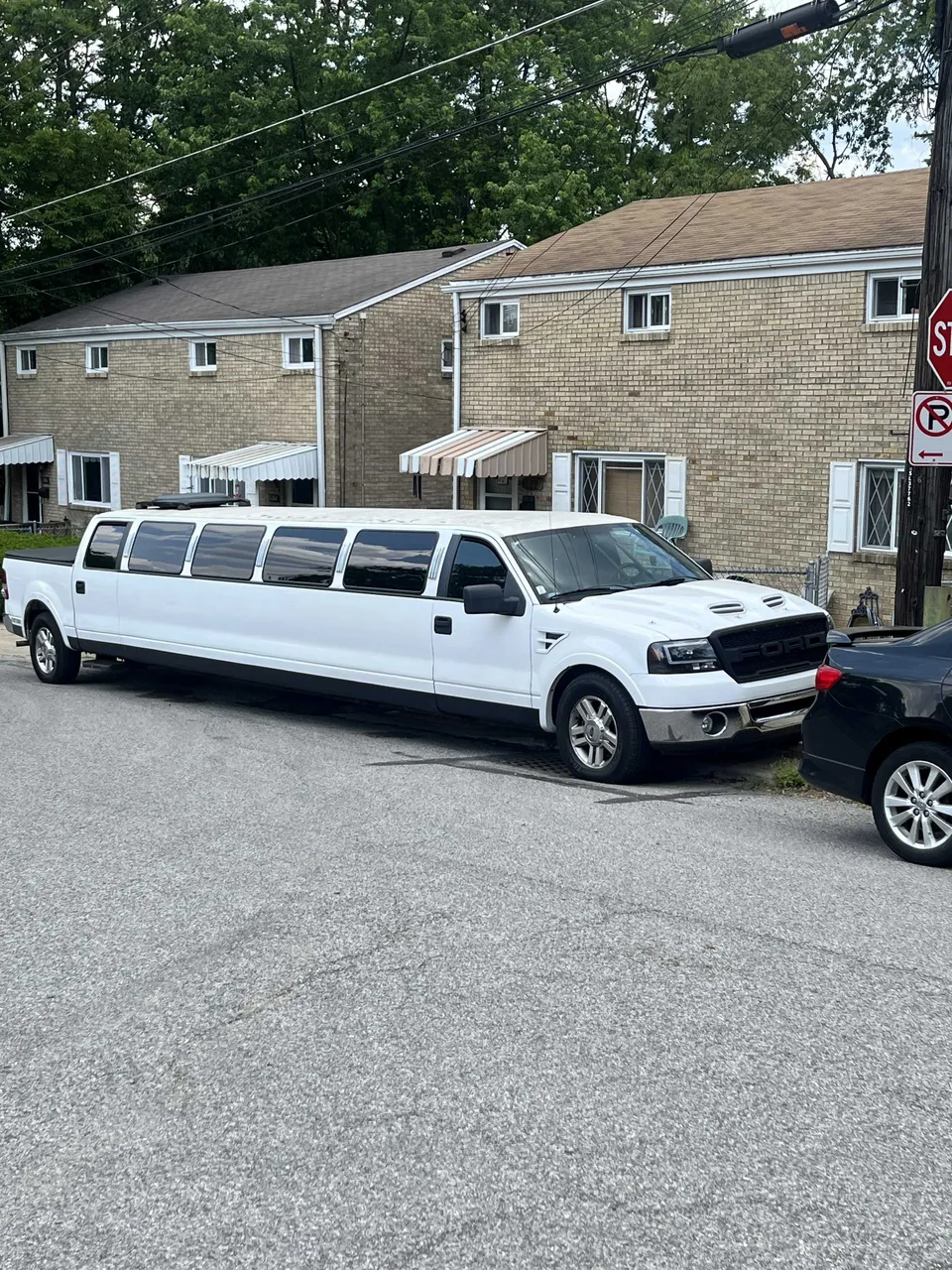 White F150 Limousine exterior for limo rental in Durham County, NC