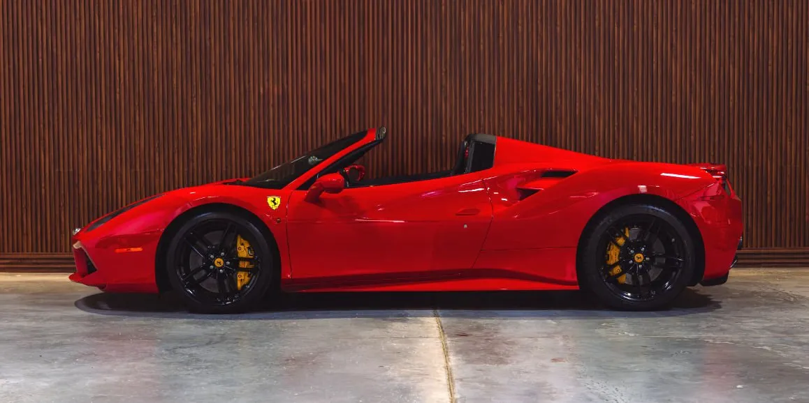Red Ferrari 488 Spider exterior with convertible roof for wedding car rental in Montgomery County, PA