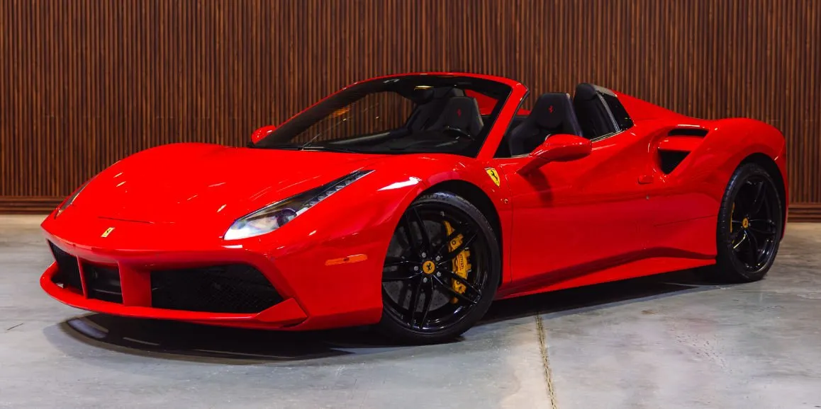 Red Ferrari 488 Spider with convertible roof for wedding car rental in Montgomery County, PA