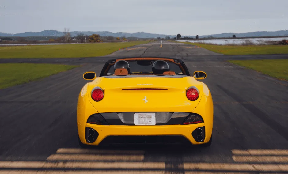 Yellow Ferrari California Convertible with convertible roof for wedding car rental in Napa, CA Yellow Ferrari California Convertible with convertible roof for wedding car rental in Napa, CA
