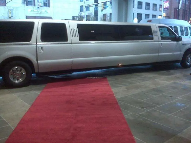 White Ford Excursion Limousine with tinted windows for limo rental in New Castle, DE