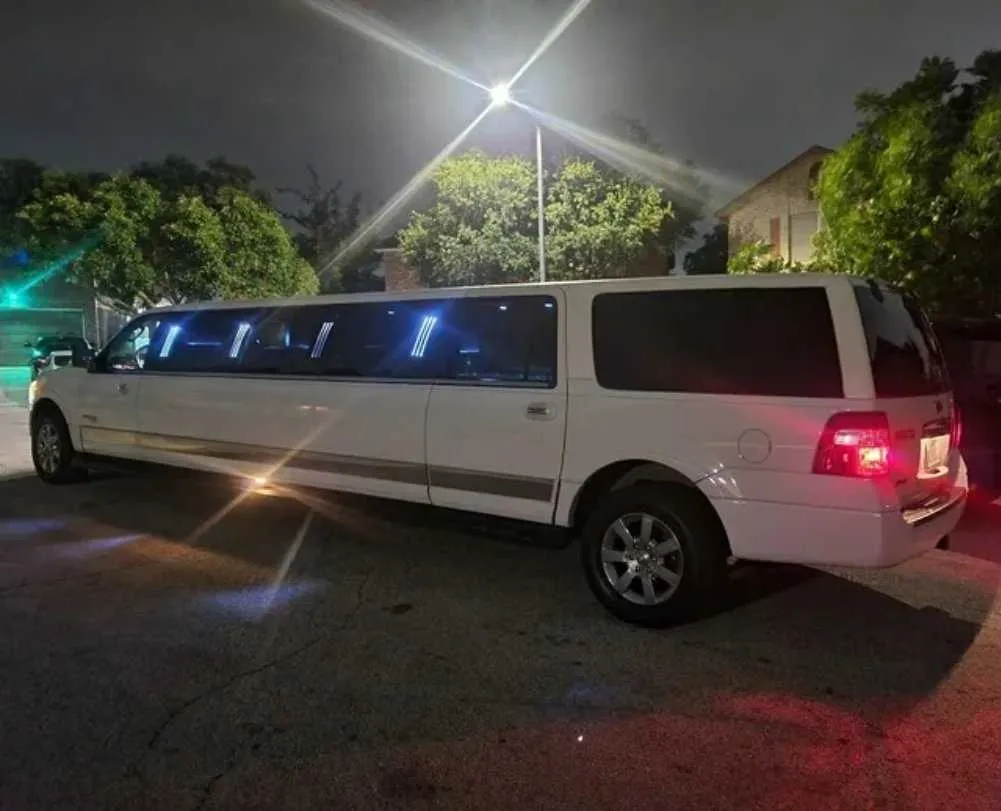 White Ford Expedition Limousine with tinted windows for limo rental
