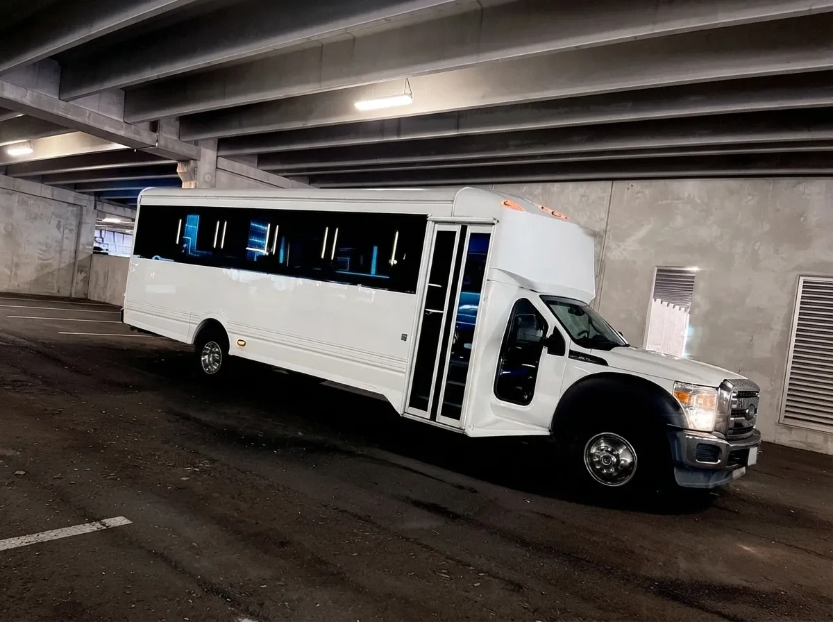 White-painted Ford F-550 Party Bus ready for booking