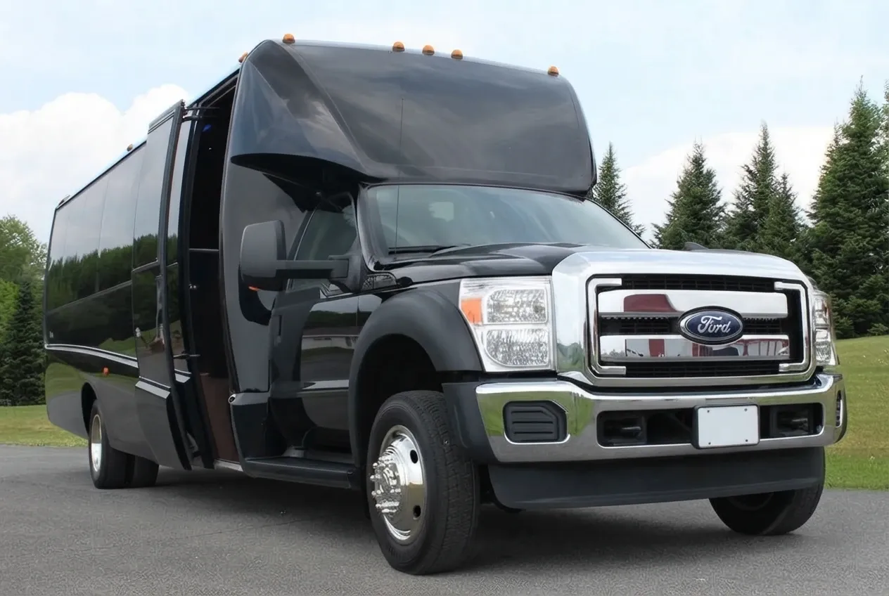 Black-painted Ford F550 Party Bus Limousine ready for booking