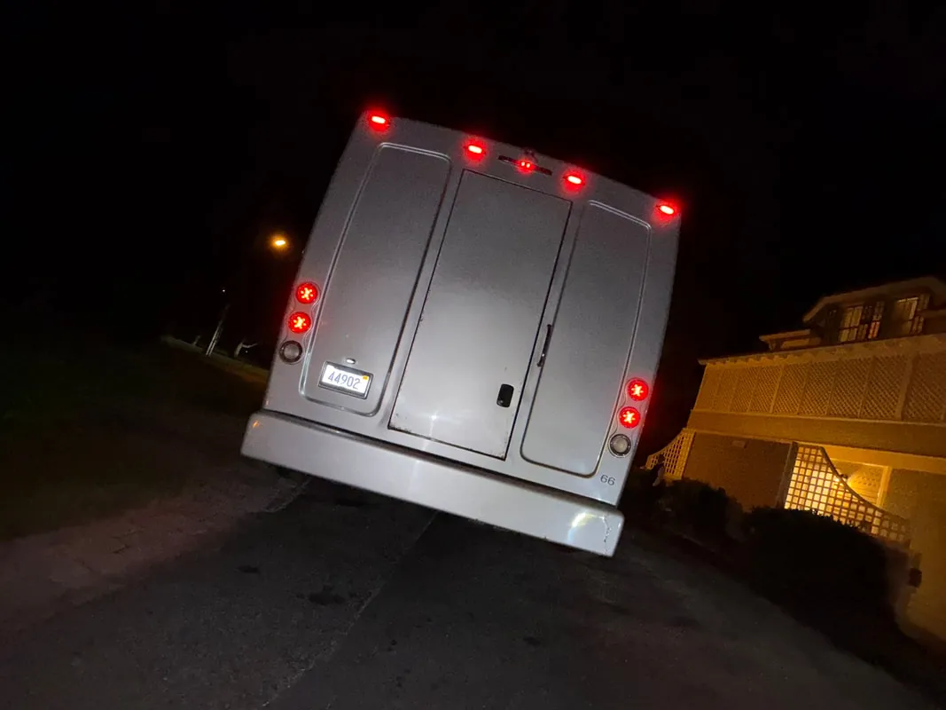 Silver Freightliner Party Bus exterior, photo 7 for party bus rental in North Attleboro, MA