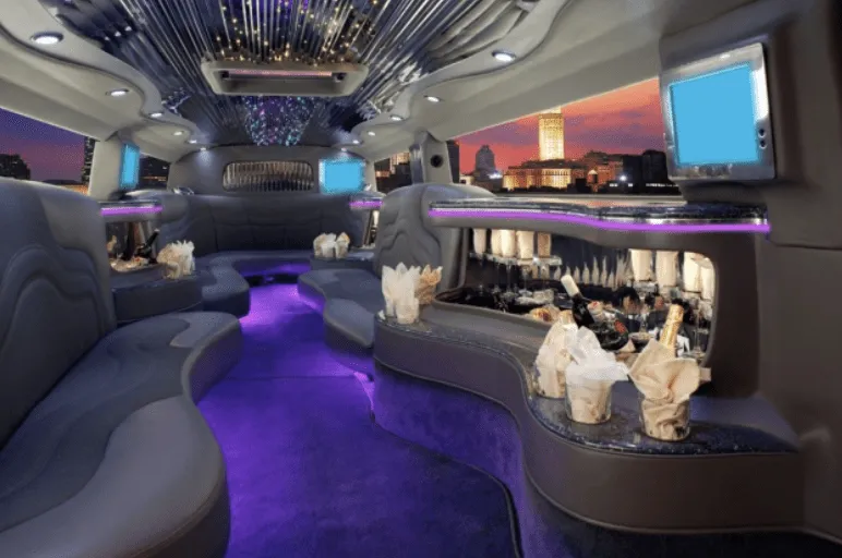 Hummer H2 Hummer H2 interior with perimeter lounge seating, LED accent lighting and starlight or fiber-optic ceiling for limo rental