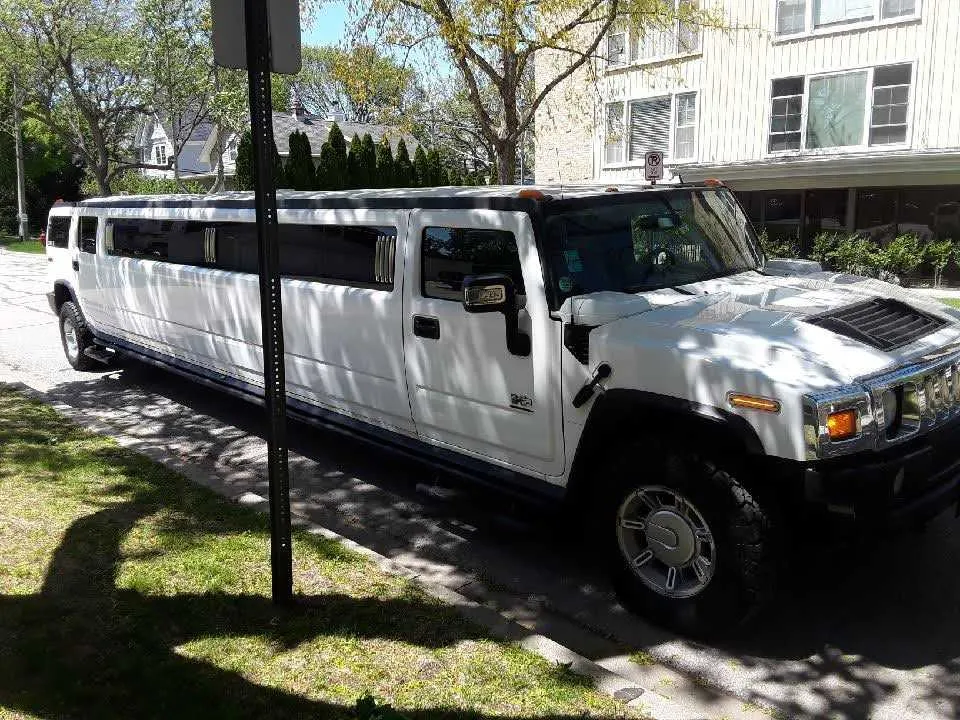 White Hummer H2 limo for limo rental
