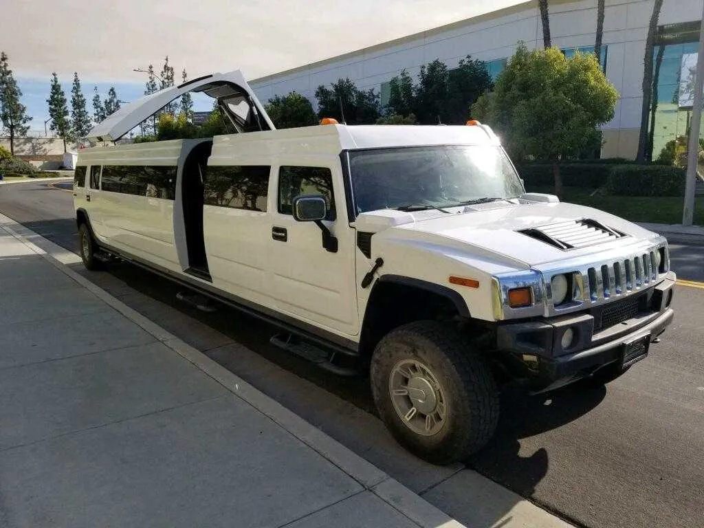 White Hummer Limo exterior, photo 2 for limo rental in Noble County, OH