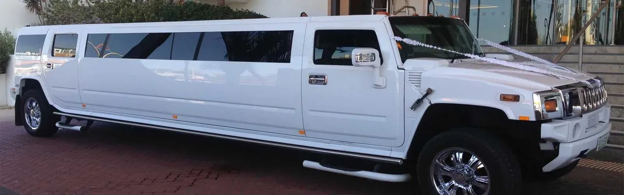 Hummer Limousine White Hummer Limousine with running boards for limo rental