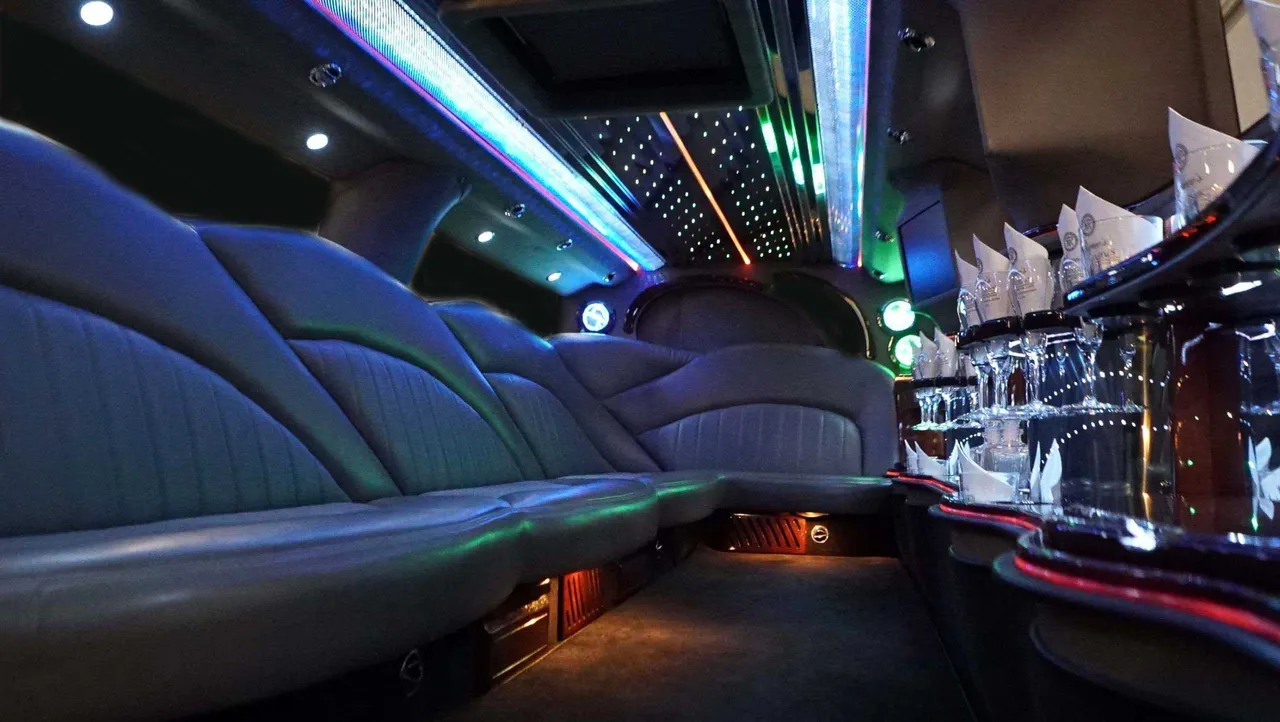 Hummer Limousine interior with LED accent lighting, LED ceiling lighting and starlight or fiber-optic ceiling for limo rental