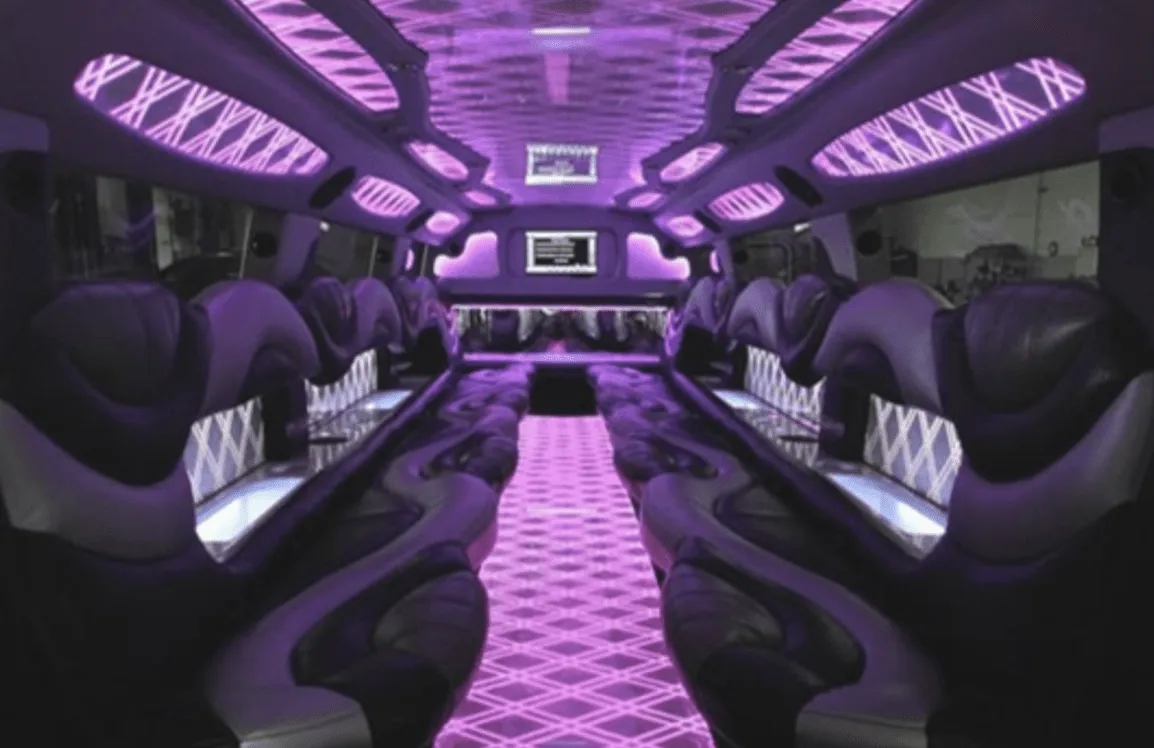 Hummer Limousine interior with perimeter lounge seating, LED accent lighting and LED ceiling lighting for limo rental in Saint Clair County, IL