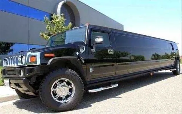 Black-painted Hummer Limousine ready for booking