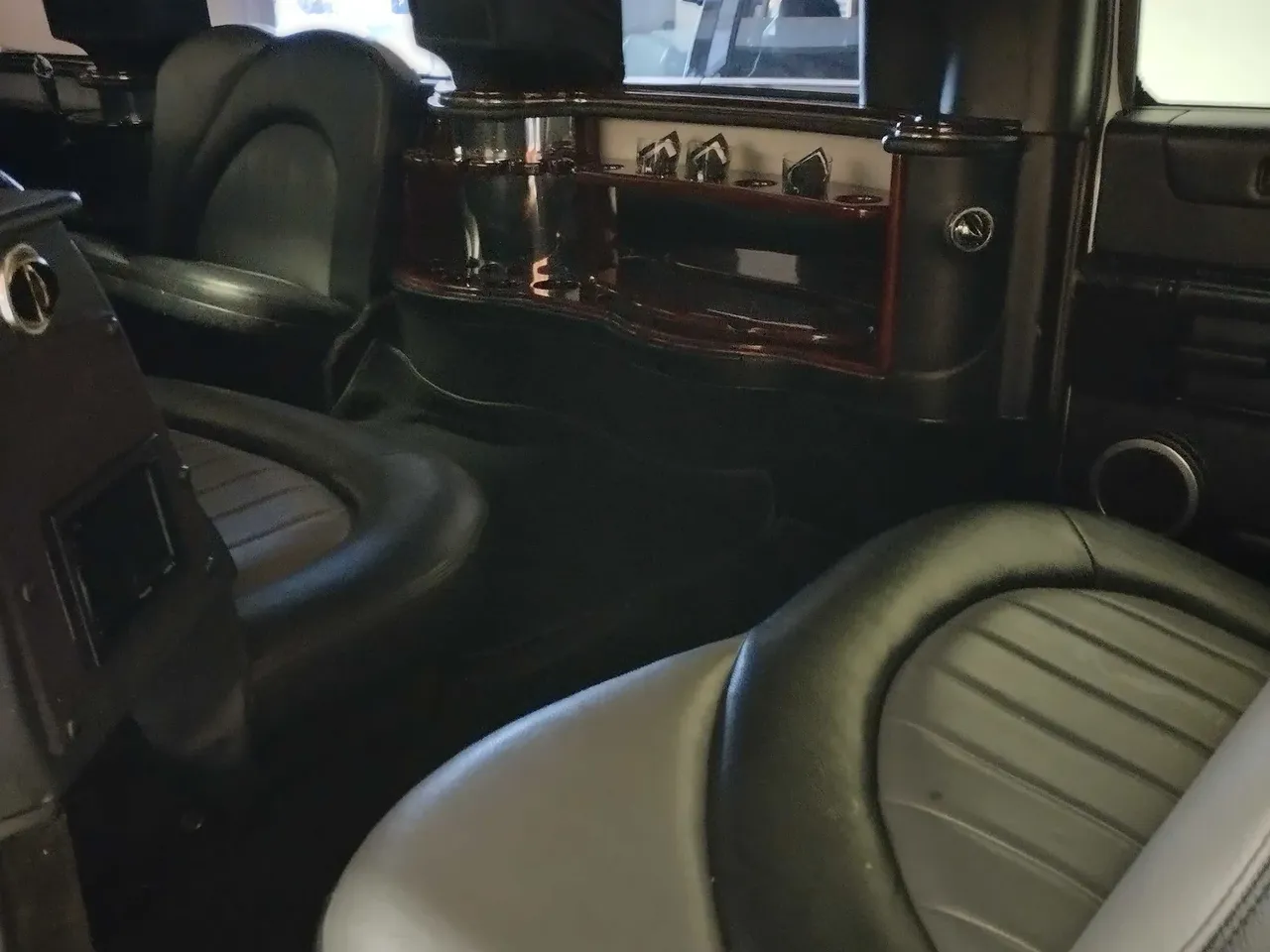 White-painted Hummer Limousine ready for booking