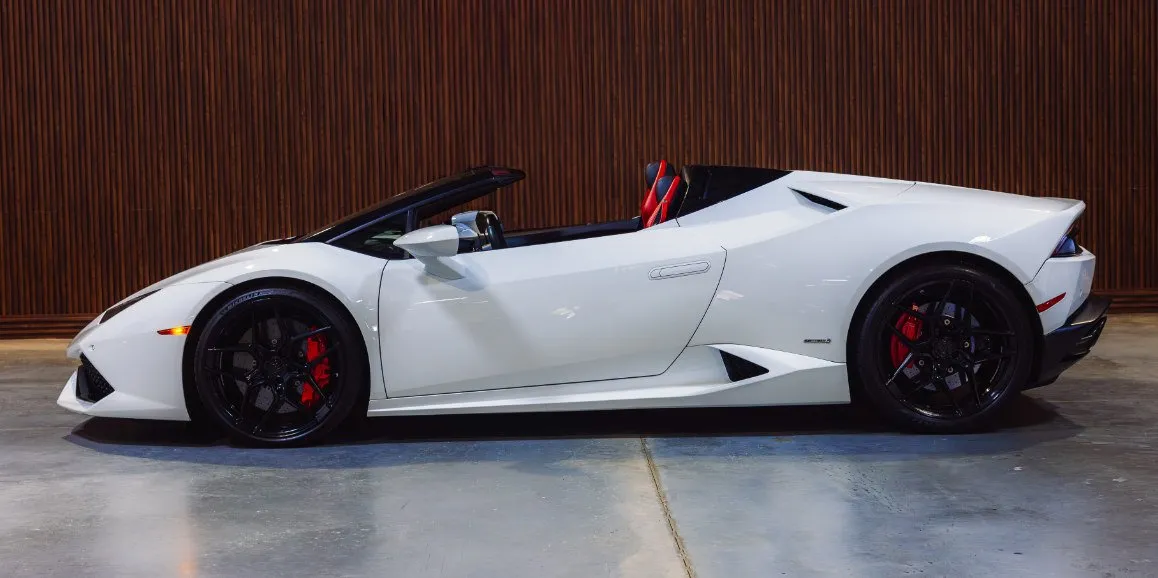 White Lamborghini Huracan exterior with convertible roof for wedding car rental in Suffolk County, NY