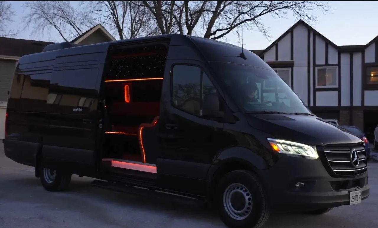 14 Passenger Limo Bus exterior for party bus rental in Allen County, OH