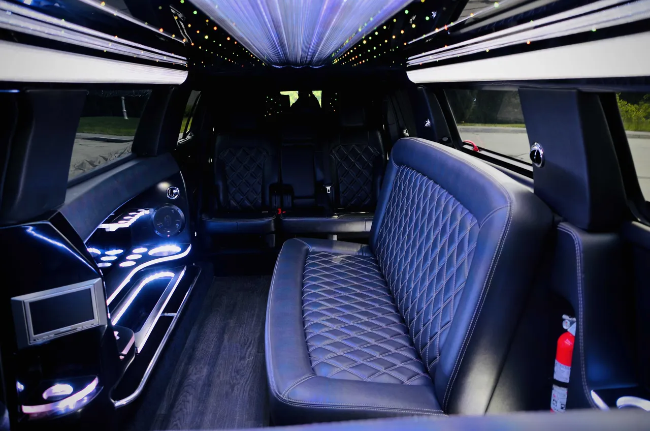 Lincoln MKT Limousine interior with LED accent lighting, LED ceiling lighting and starlight or fiber-optic ceiling, photo 3 for limo rental