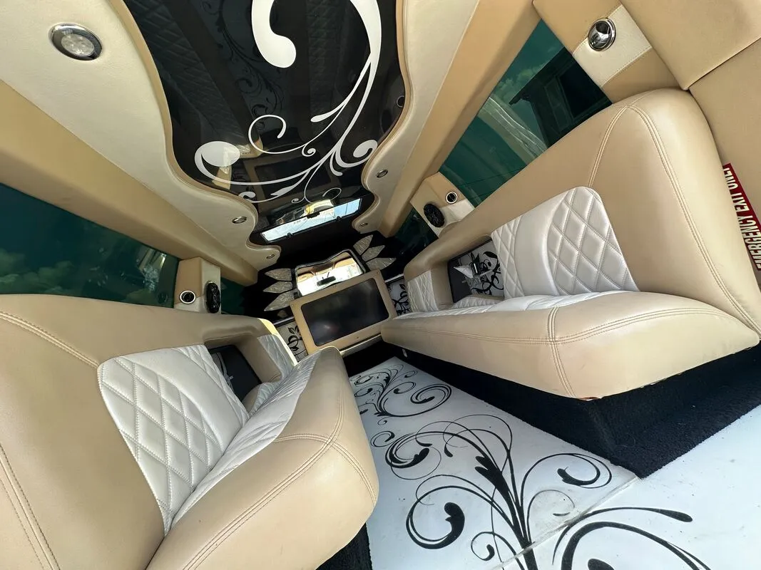 18 Passenger Lincoln Navigator interior with TV screens, photo 9 for limo rental