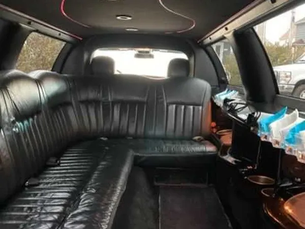 Lincoln Town Car White-painted Lincoln Town Car ready for booking