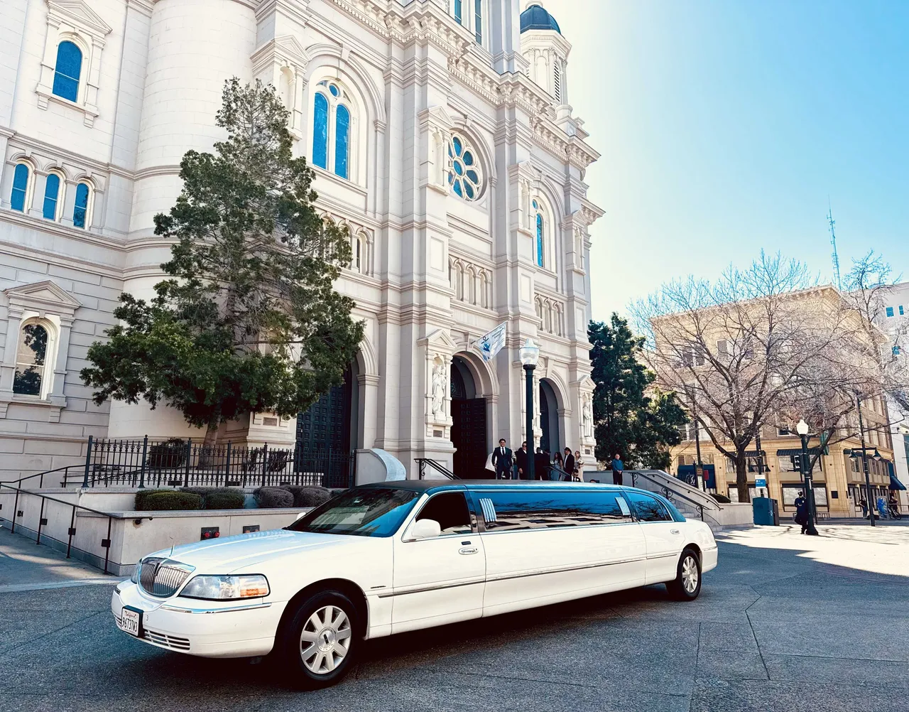 White Lincoln Town Car Limousine with tinted windows for limo rental in Citrus Heights, CA
