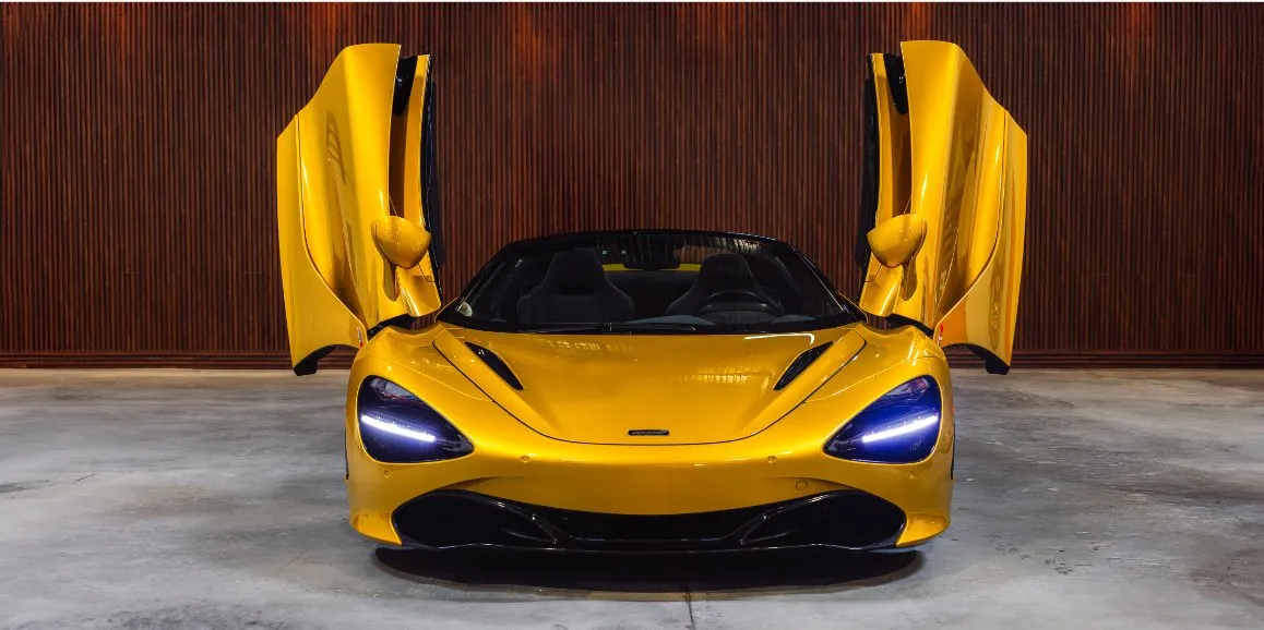 Yellow McLaren 720S exterior with convertible roof for wedding car rental in Suffolk County, NY