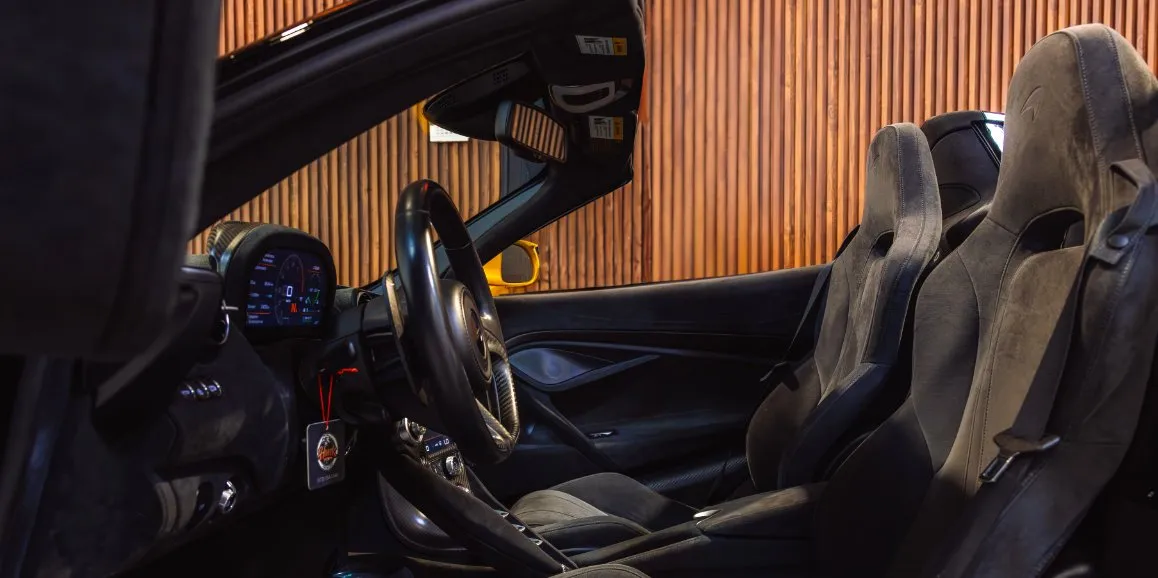 McLaren 720S interior with convertible roof for wedding car rental in Suffolk County, NY
