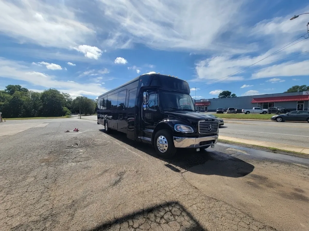Black-painted Mercedes-Benz Party Buses ready for booking
