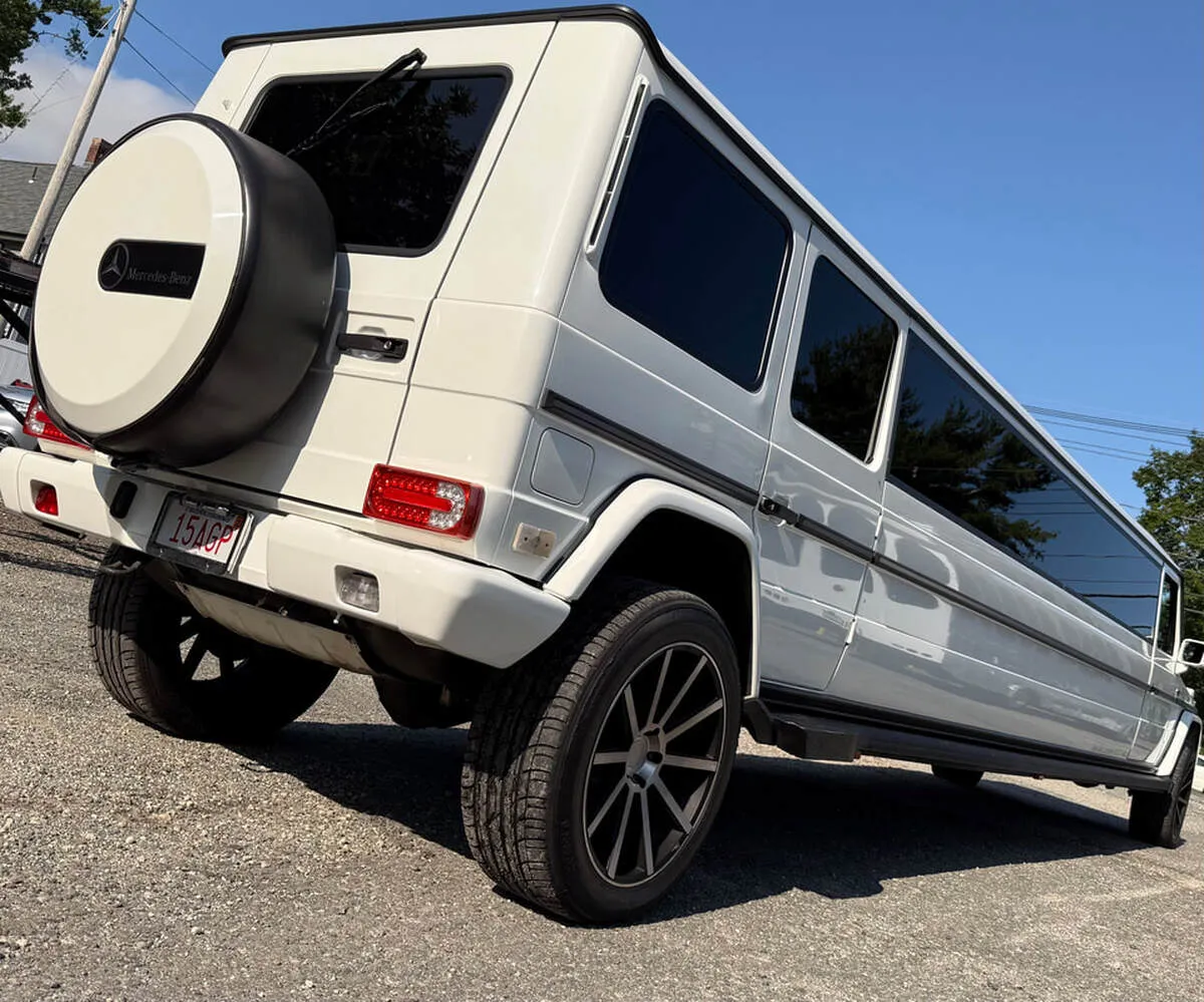 White Mercedes-Benz G Wagon exterior with tinted windows for limo rental