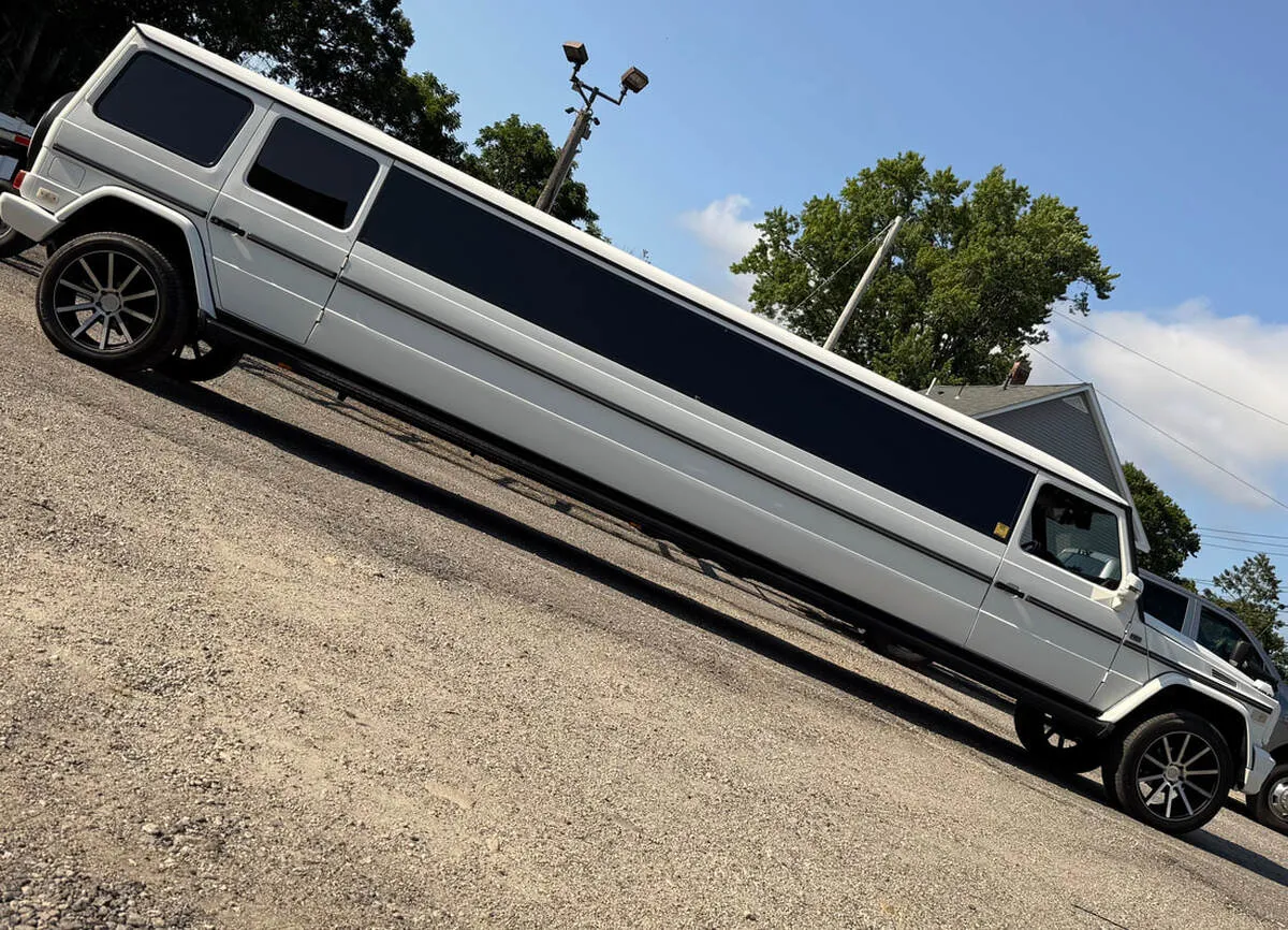 White Mercedes-Benz G Wagon exterior with tinted windows, photo 5 for limo rental