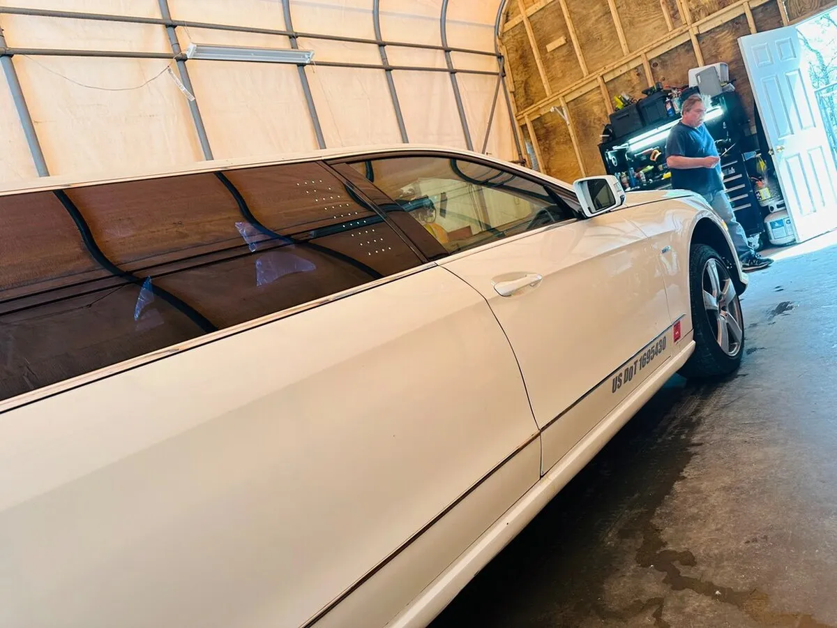 White Mercedes-Benz Jet Doors Limousine exterior with tinted windows, photo 6 for wedding car rental in North Attleboro, MA