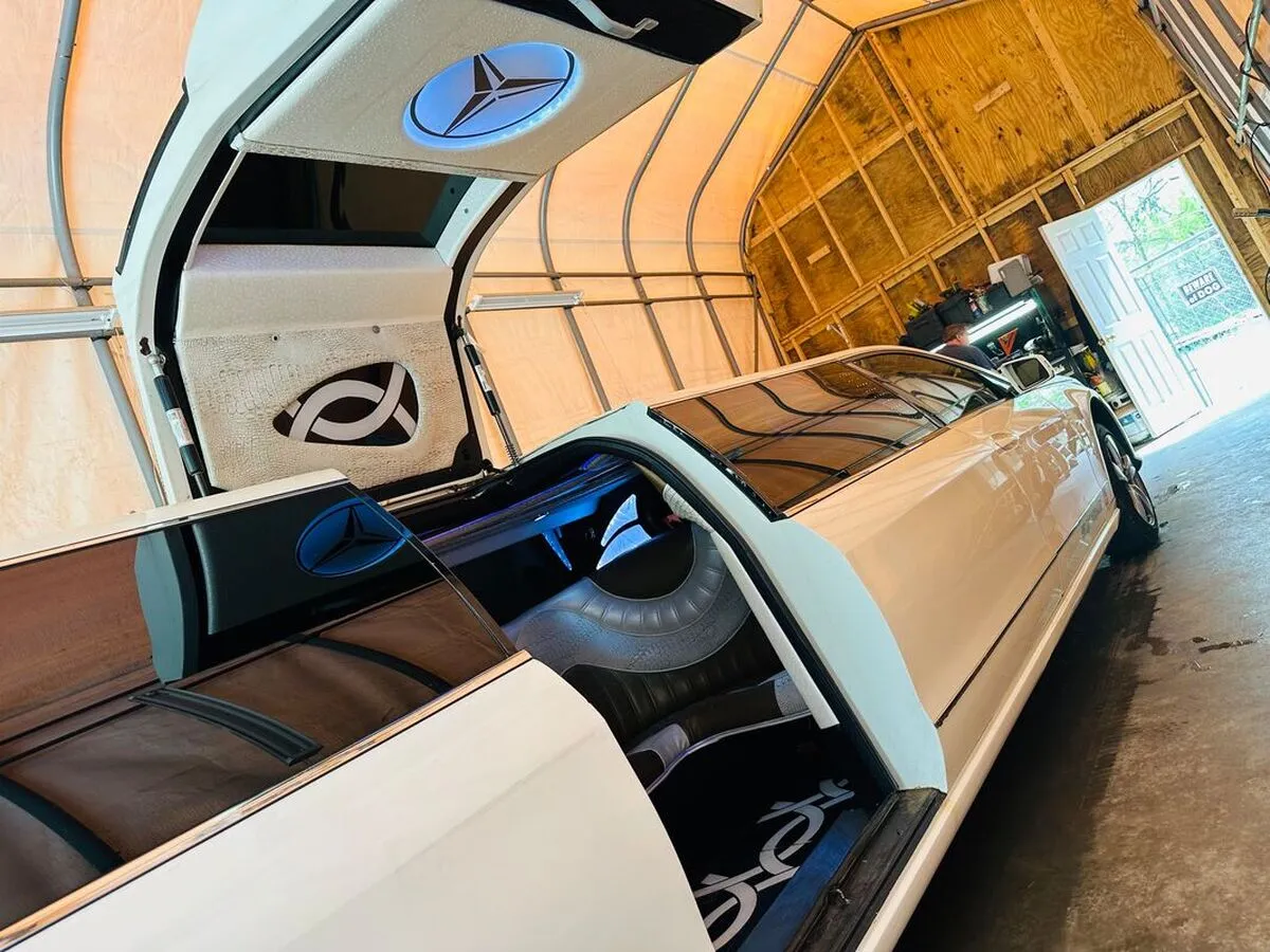 White Mercedes-Benz Jet Doors Limousine with bridal (jet) door for wedding car rental in North Attleboro, MA