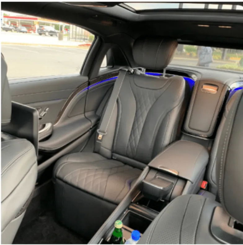 Mercedes-Maybach interior with cup holders and LED accent lighting for wedding car rental