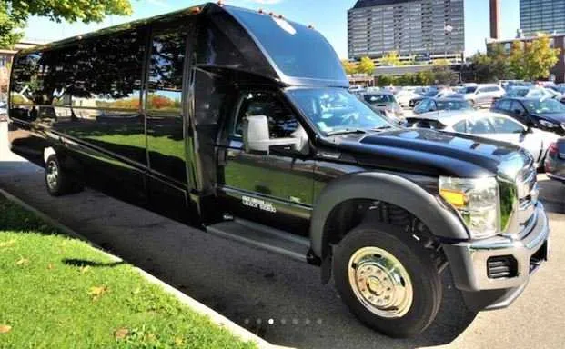 Black-painted Mini Coach Limousine Bus, tinted windows