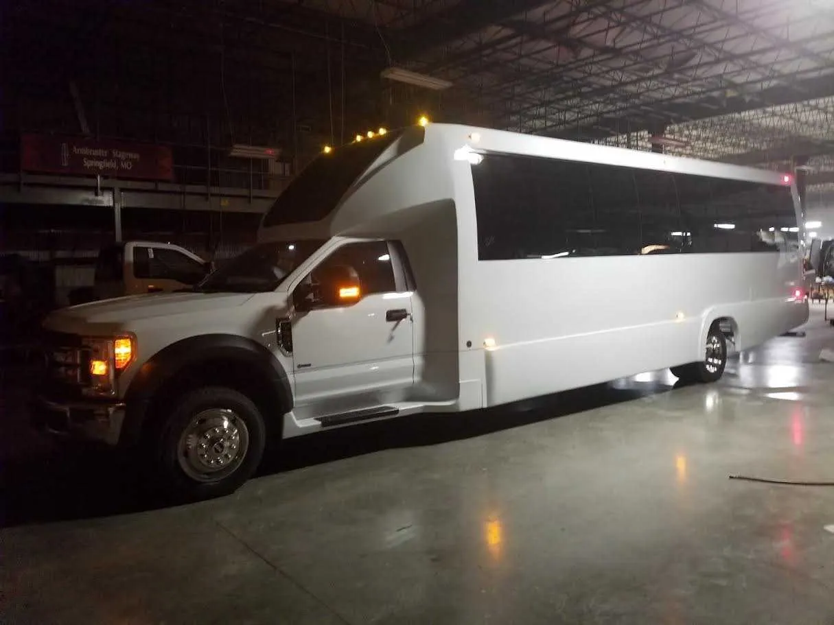 28 Passenger Party Bus White 28 Passenger Party Bus with tinted windows for party bus rental
