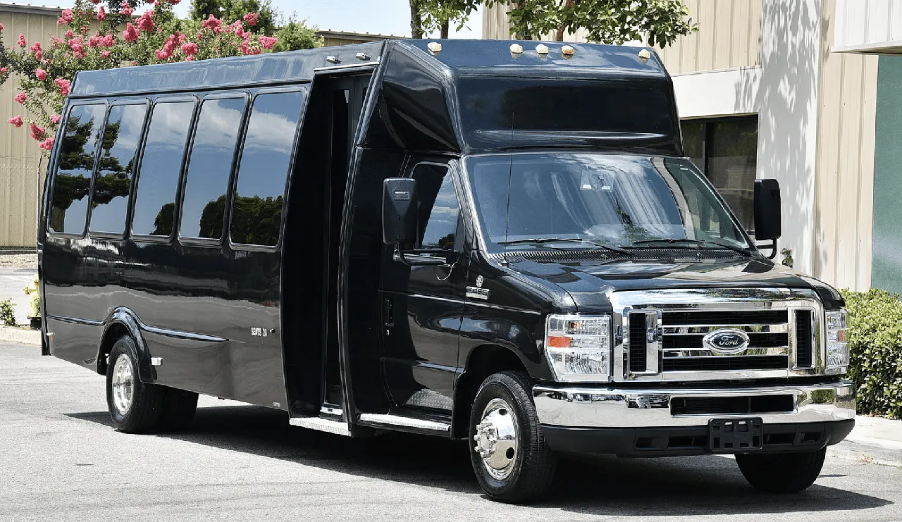Black 20 Passenger Party Bus exterior for party bus rental in Laramie County, WY