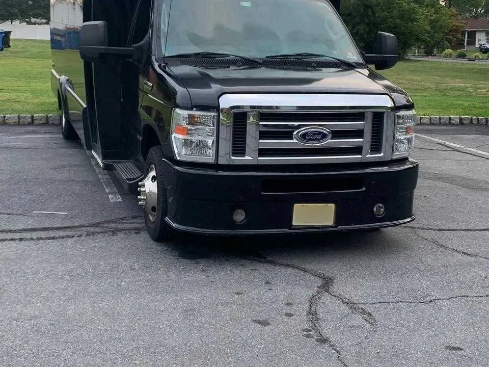 25 Passenger Party Bus Black-painted 25 Passenger Party Bus ready for booking