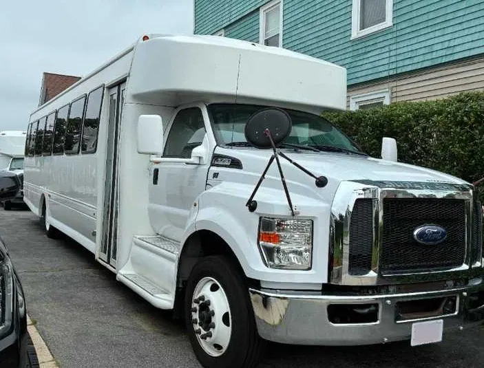Black-painted 36 Passenger Party Bus ready for booking