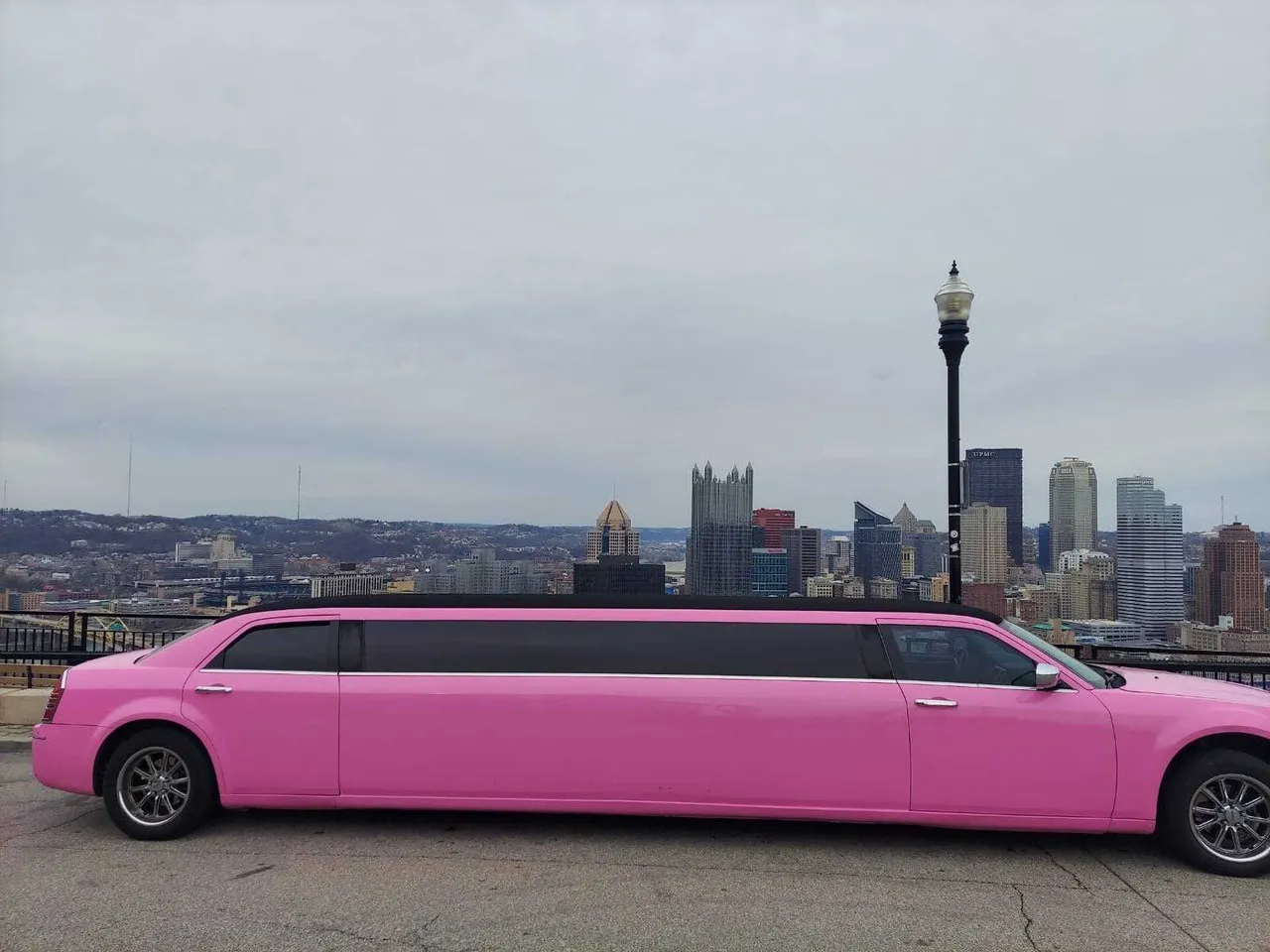 Pink Limousine with tinted windows for limo rental in Washington County, PA