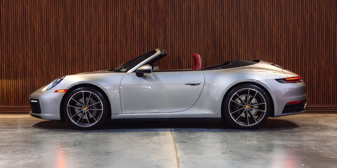 Silver Porsche 911 exterior with convertible roof for wedding car rental in Toms River, NJ Silver Porsche 911 exterior with convertible roof for wedding car rental in Toms River, NJ