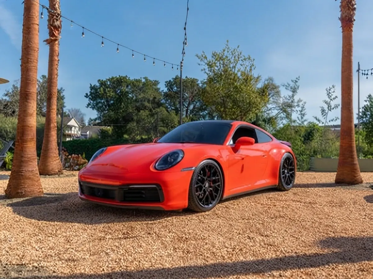 Red-painted Porsche 911 ready for booking